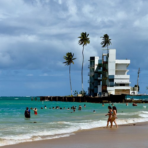 On a rocky point at the far eastern end of the beach in Isla Verde, where Calle Amapola runs into the Atlantic, sits this mag...
