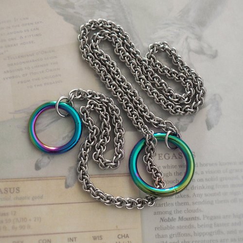 been a hot minute since i've posted about the cosmic slip necklace.

it's the perfect choker for pride month and all of summe...
