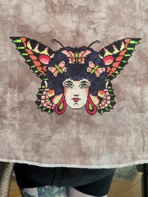 recovering from a nasty cold but finished this pretty lady while recovering! patterns is available on my website in the bert grimm section 🦋 #crossstitch #tattoo #americantraditional #artreveal #butterfly 