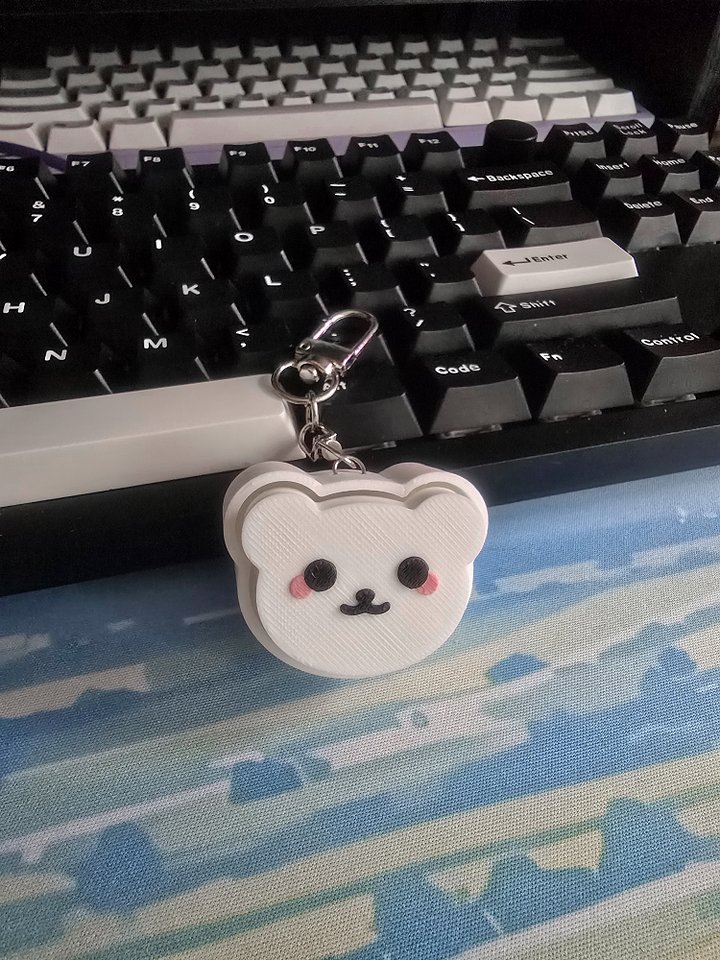 Polar bear clicker keychain product image (1)