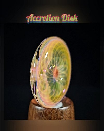 Ethereal lines of 24k gold and pure silver lines interweave their way through this Accretion Disk 🪐

This beauty has an Ether...
